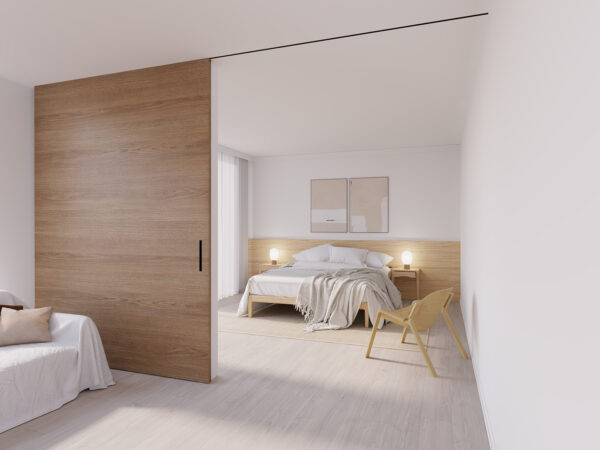 Sistema de puertas correderas Essential Timber de hasta 90 kg con guías y ruedas suaves para divisiones interiores.